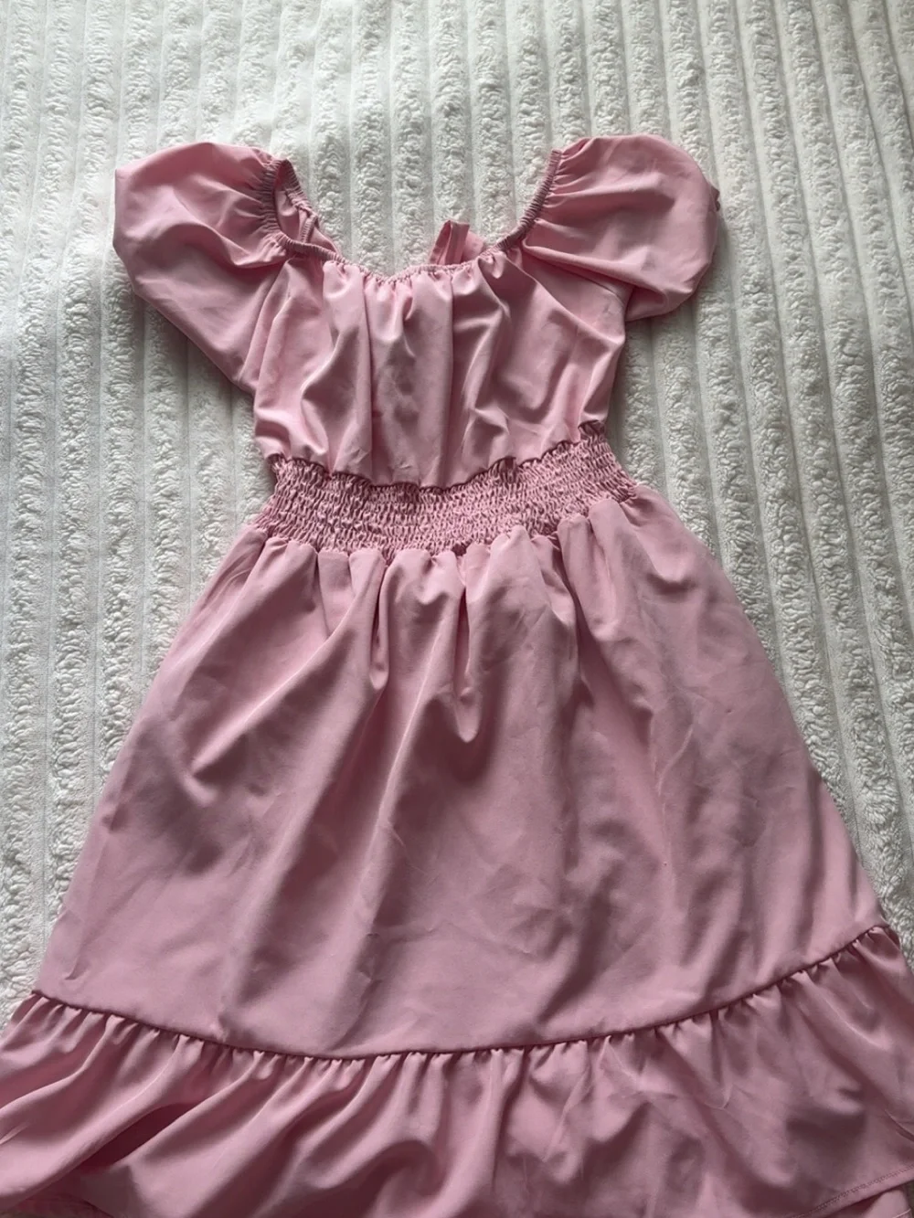 Pink babydoll dress with bow detail